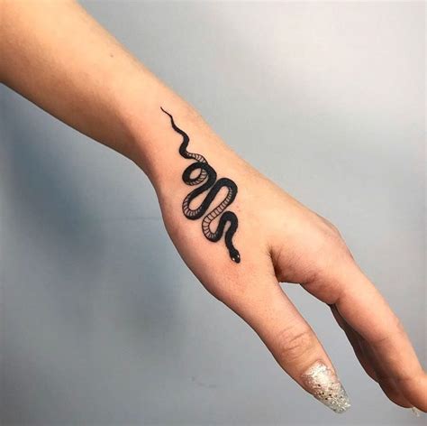 hand snake tattoo